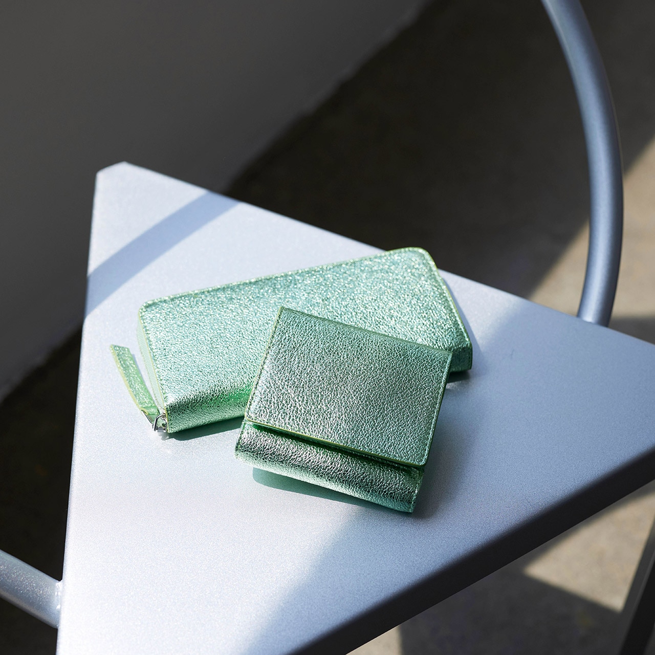 【TREASURE TOPKAPI】ウォッシュド レザー メタリック 二つ折り財布