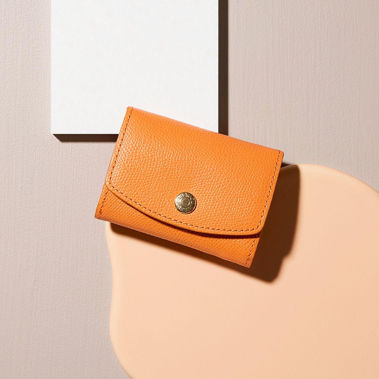 【TOPKAPI】COLORATO コロラート 角シボ型押し ラウンドフラップ 三つ折り 財布